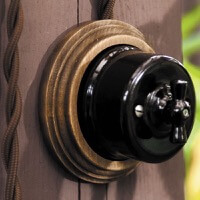 Розетки и выключатели Лизетта, Керамика,  Цвет: Черный, Цвет рамки: Натурель.